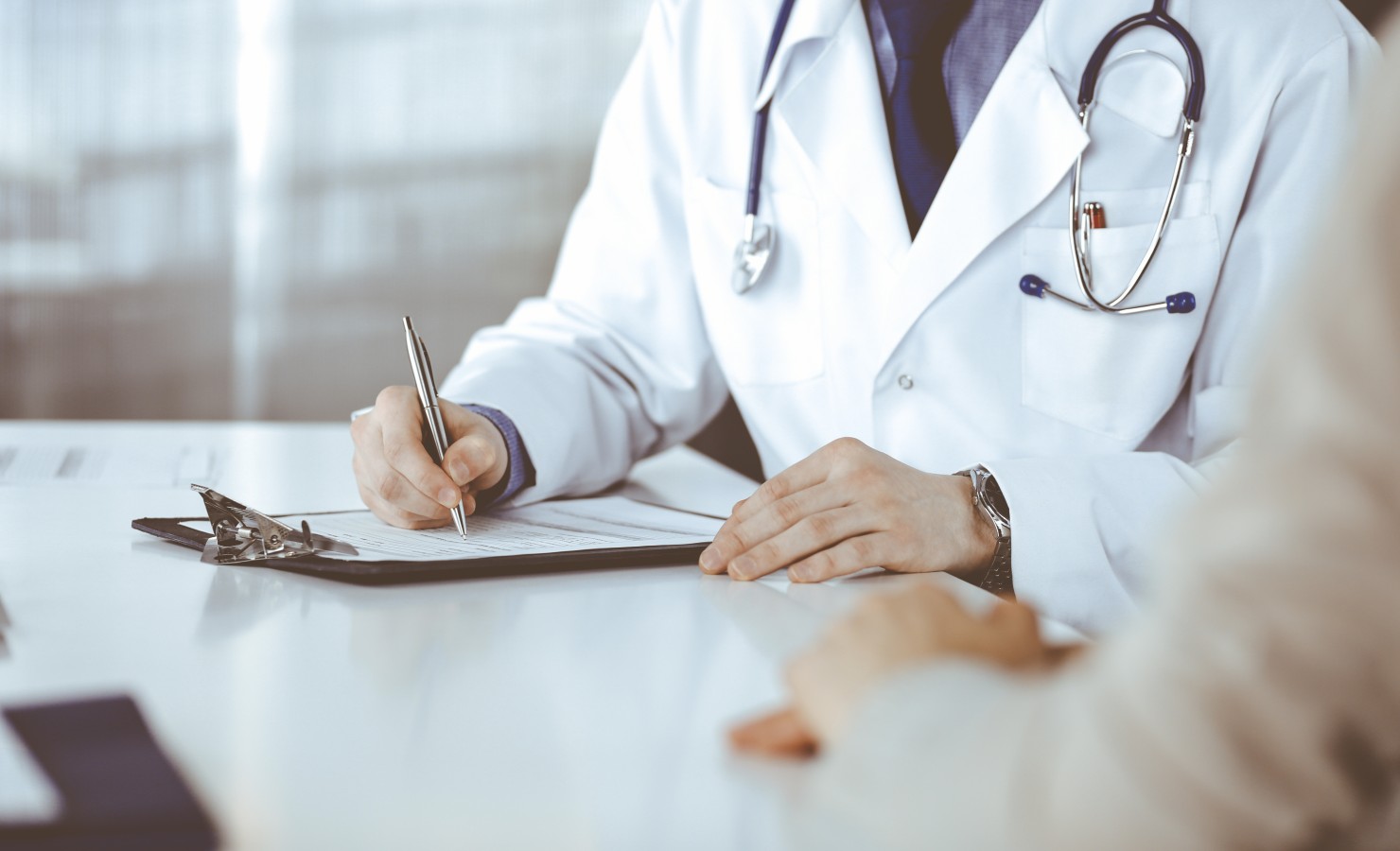 medical doctor at a table