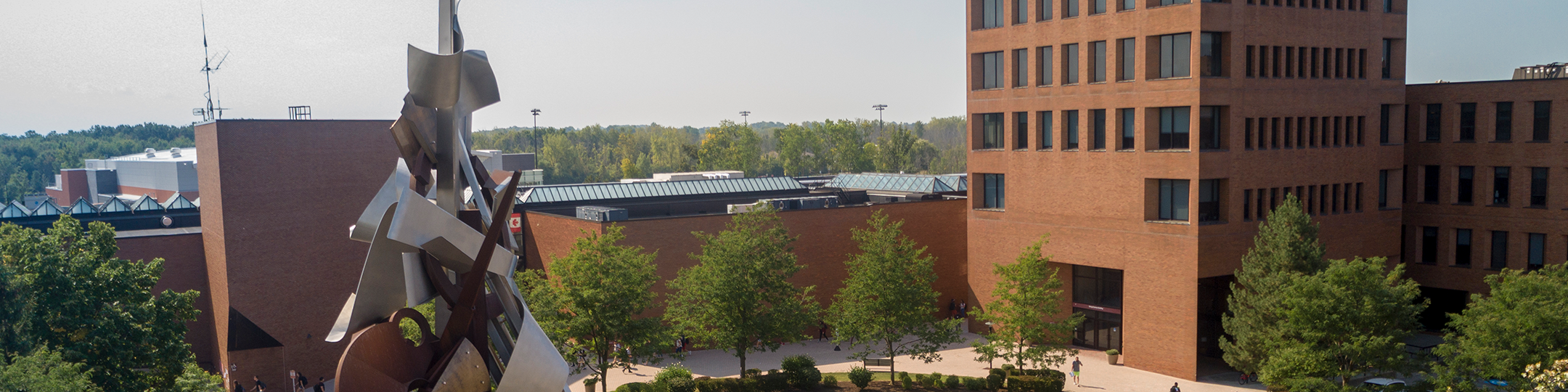 aerial image of the sentinel sculpture and Eastman Hall and SAU on RIT campus