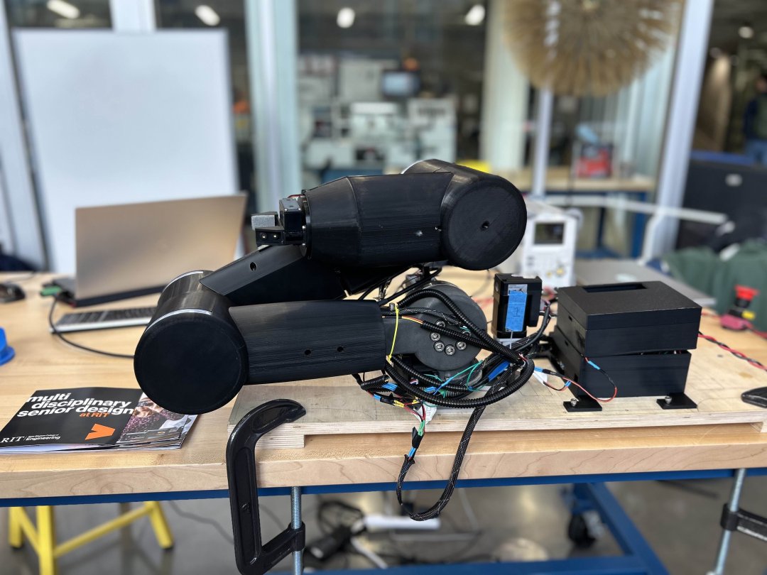 Robot arm in collapsed position.