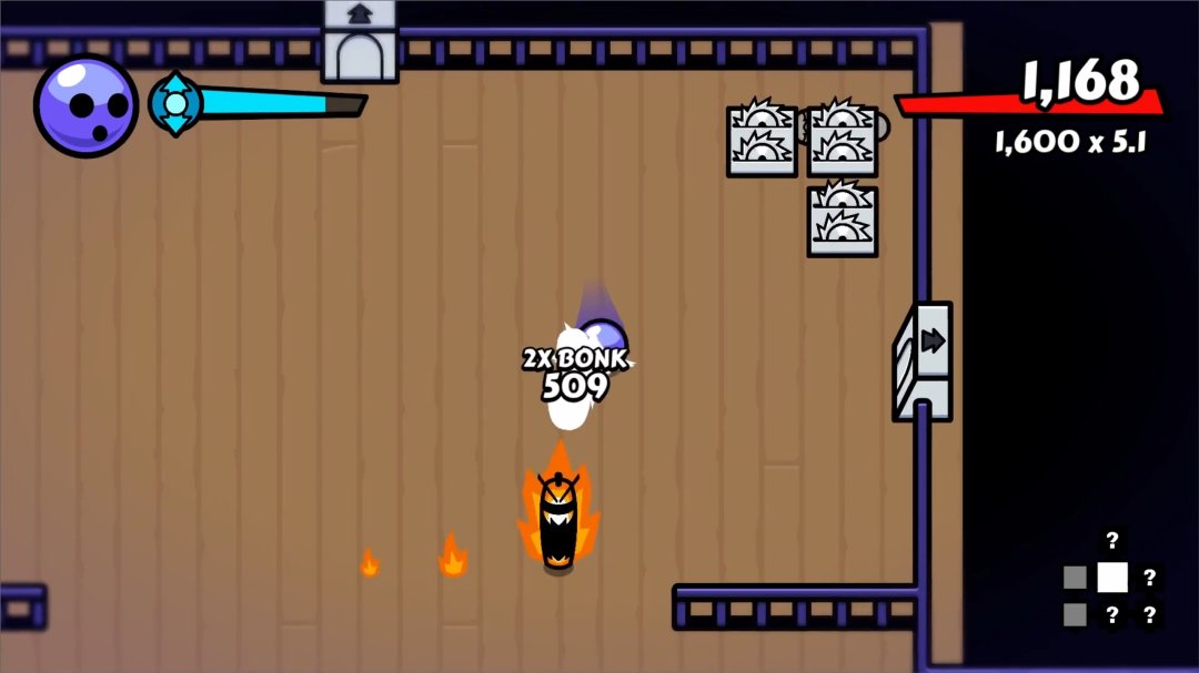 A screenshot of Unholy Roller gameplay. The Roller knocked down a Burner pin, with another Burner pin lit on fire and running around the room.
