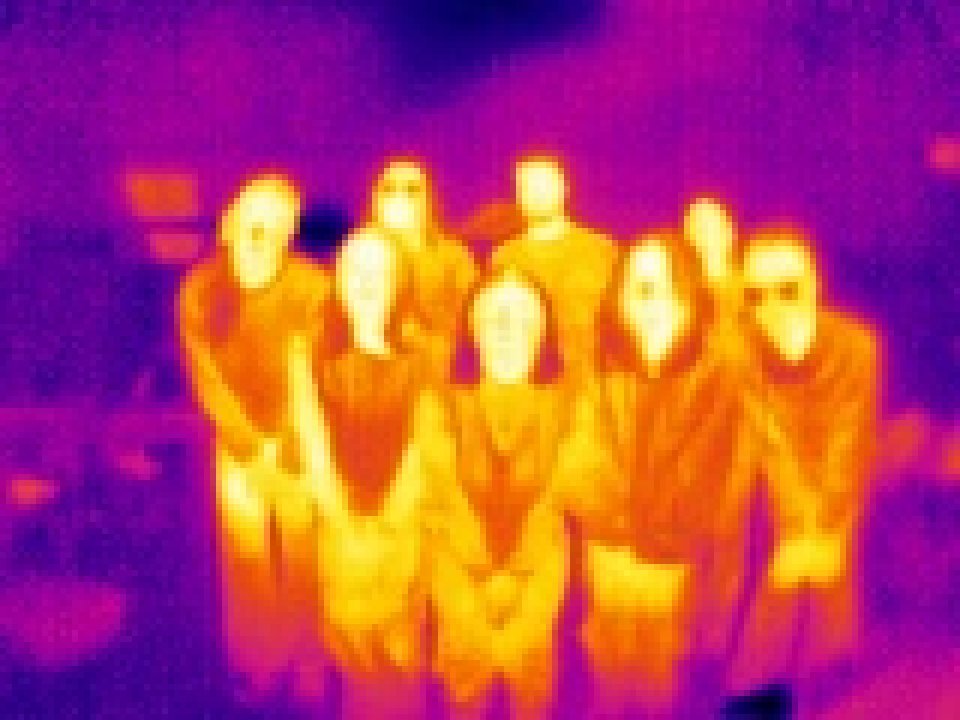 Thermal image of two rows of students in a classroom