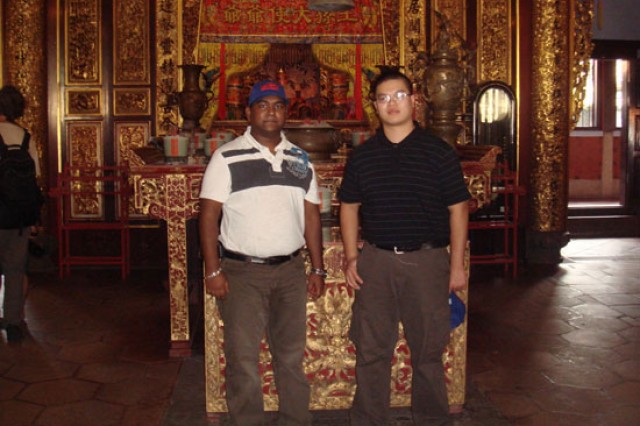 Two student posing in room