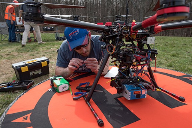 Person working on Drone