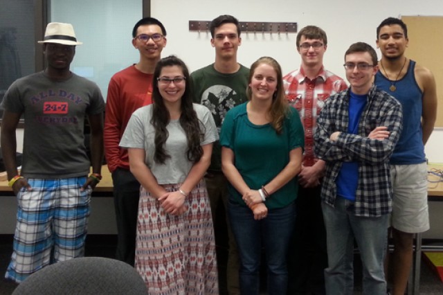 People gathered in classroom for picture