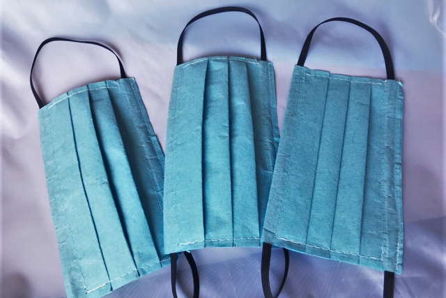 three surgical face masks.