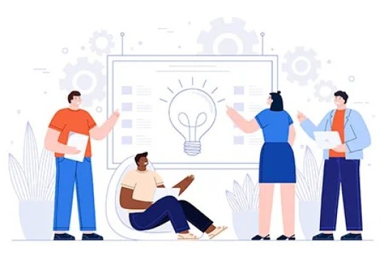 Clipart of three people standing looking at a board and one person sitting.