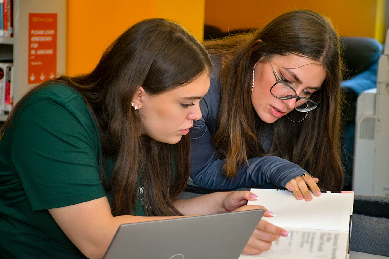 photo of students at the library