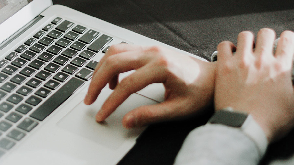 picture of a person working on a laptop