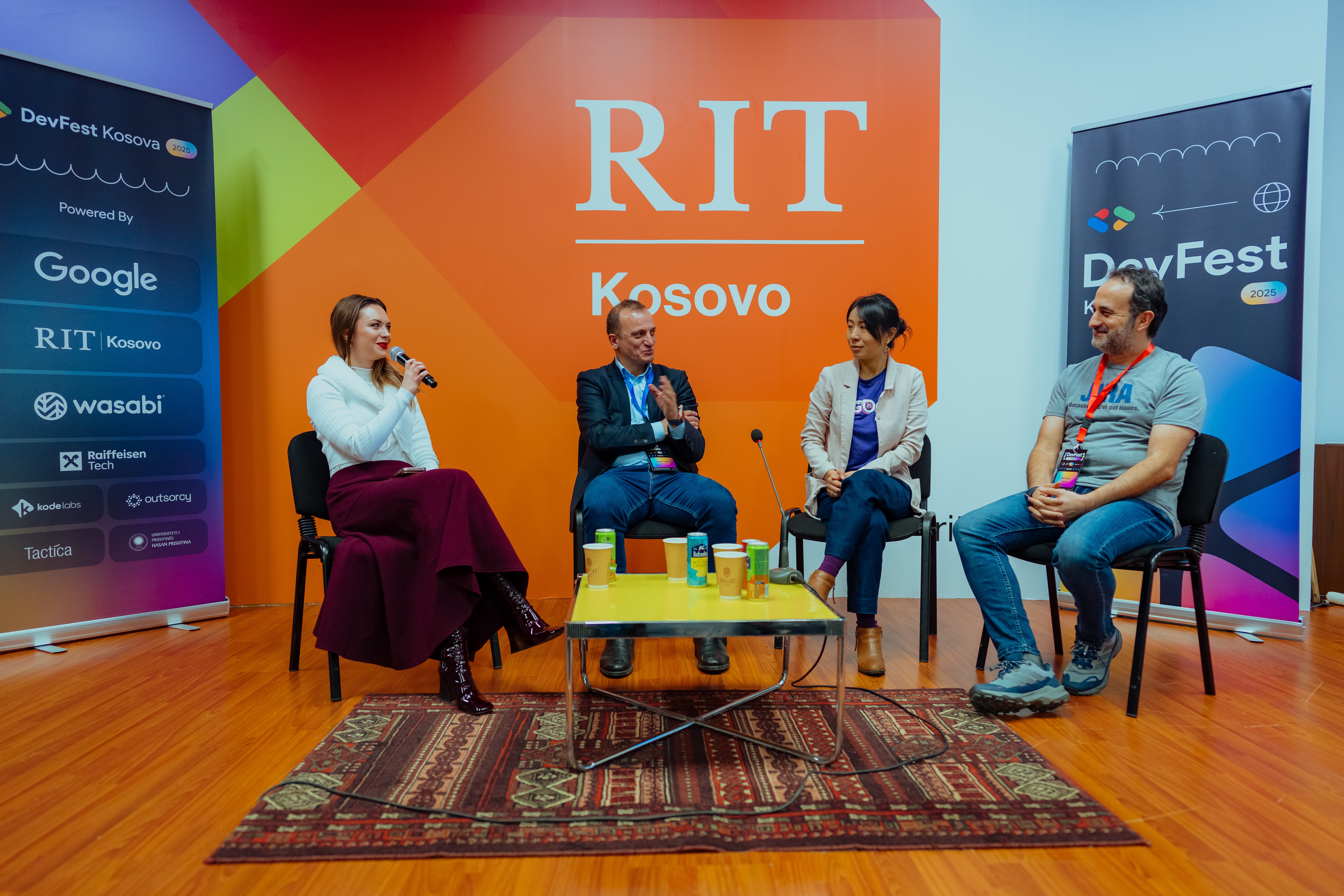 photo of guest speakers addressing audience