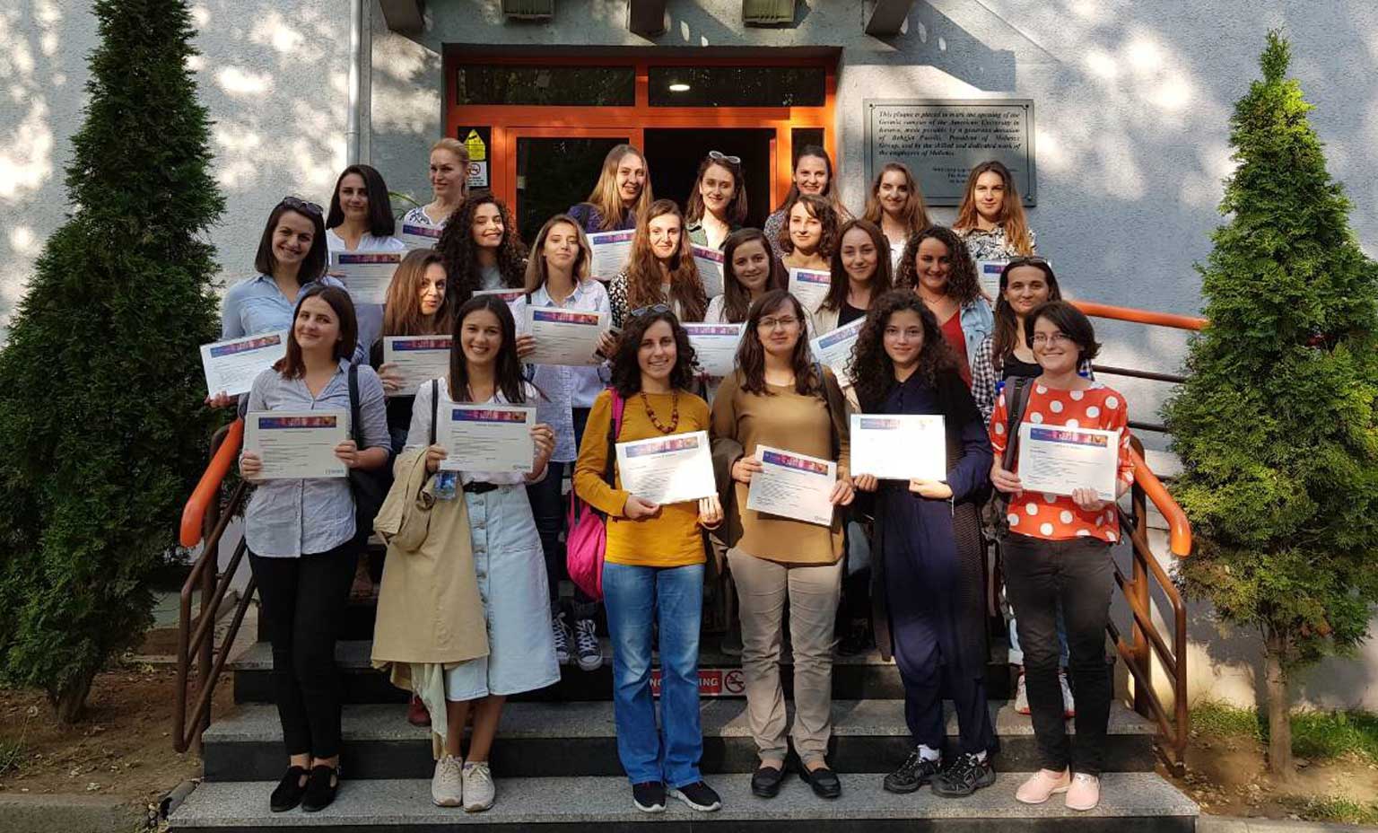 Certified Team holding Certificates