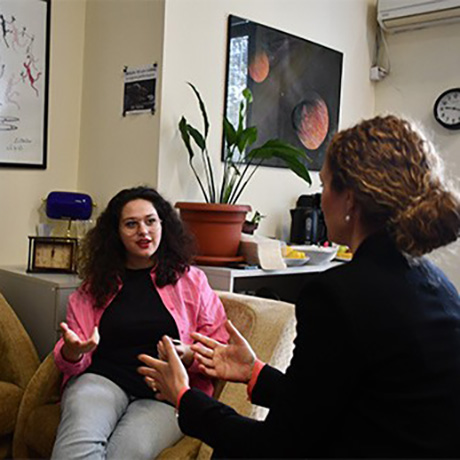 People talking in a business setting.