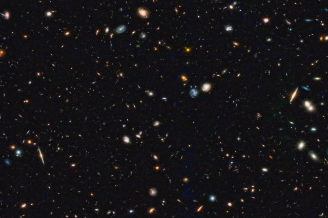 An image of many tiny, distant galaxies taken by the James Webb Space Telescope