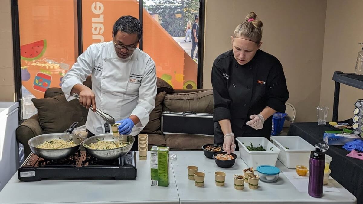 2 chefs preparing food at FoodShare during a demonstration