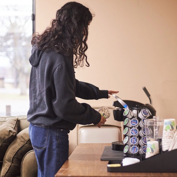 A student using the free Keurig at FoodShare West