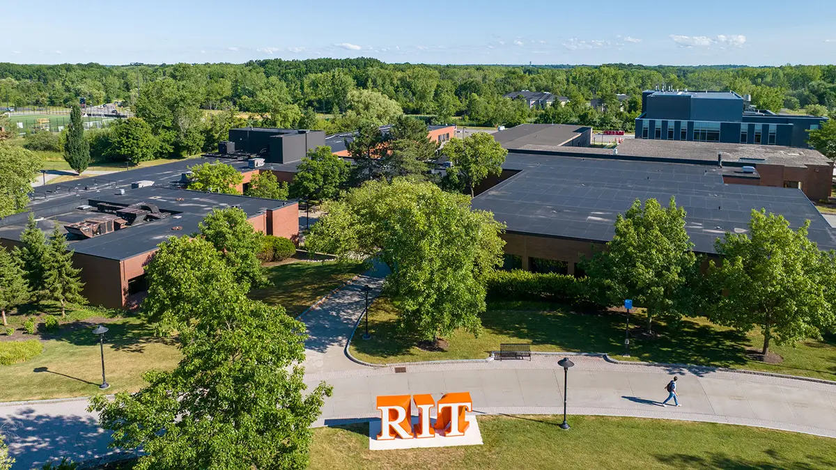 Aerial view of the R I T campus, with the R I T sculpture near the bottom. 