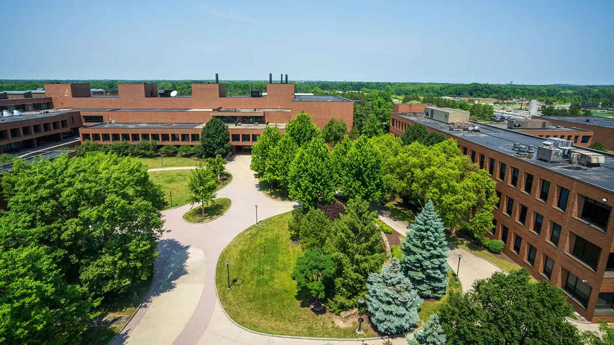 Overhead shot of campus with lots of green trees