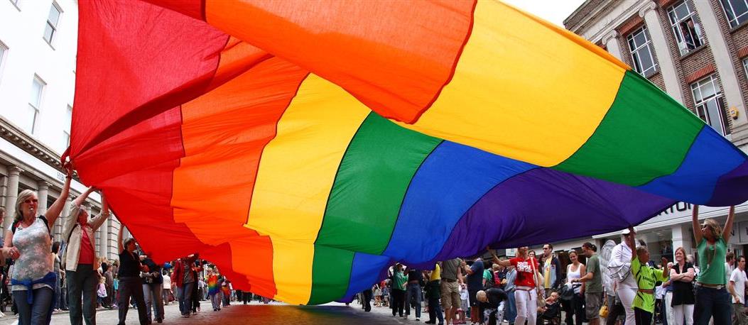 Rainbow flag at parade.