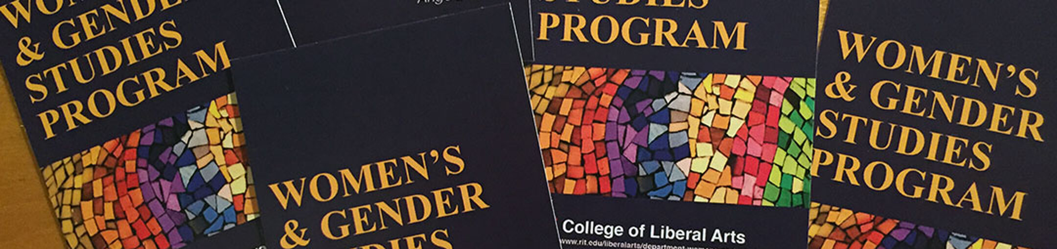 A pile of pamphlets for the Women's and Gender Studies Program.