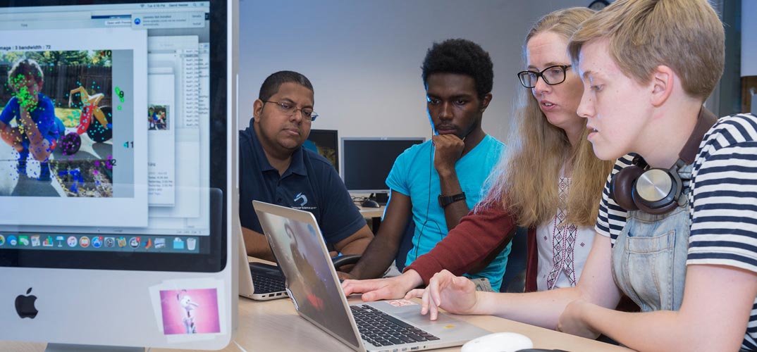 A group of students working on a project together