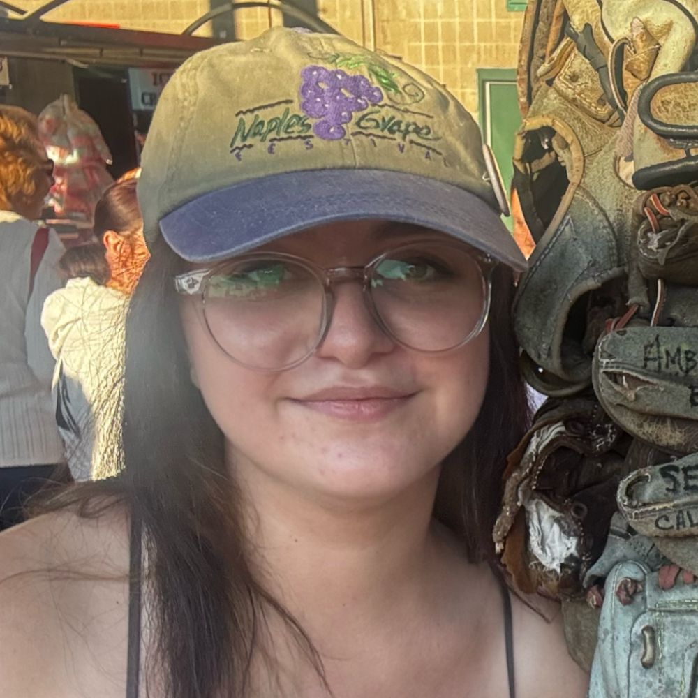 mariam in a baseball hat