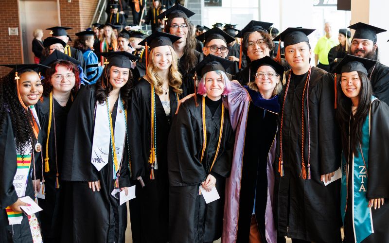 commencement smiling group of students
