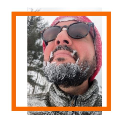 a snowy-faced, smiling dr banta