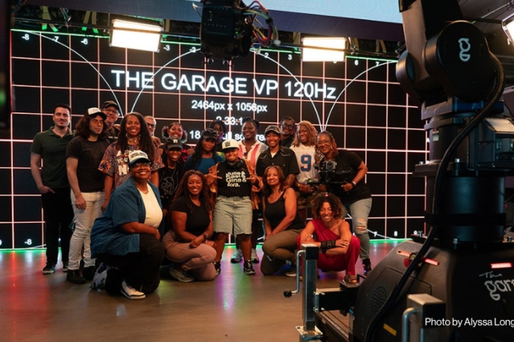 Marica and a group of participants in a studio