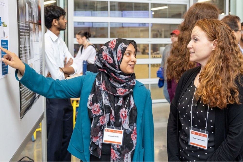 sayyada at the research symposium this summer