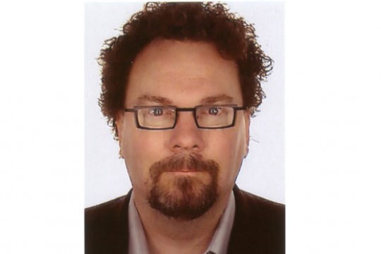 Professor posing for camera