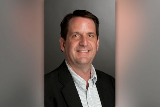 Professor posing for camera