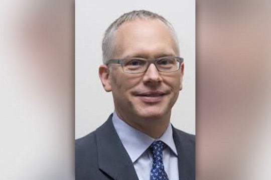 Professor posing for camera