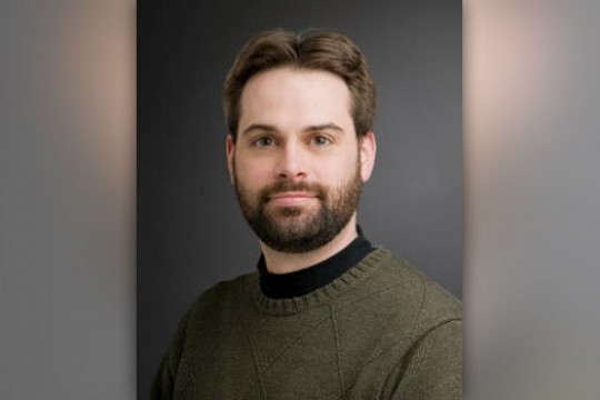 Professor posing for camera