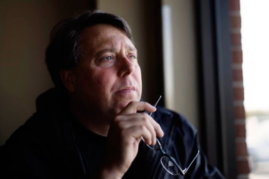 Person looking out window