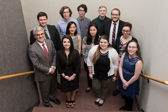 Group of students posing for picture of winners.