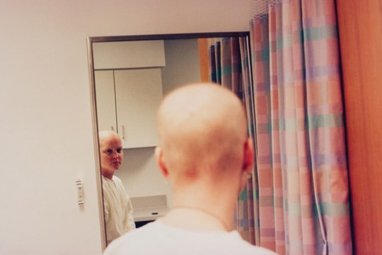 Person looking at self in mirror
