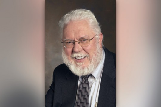 Professor posing for camera