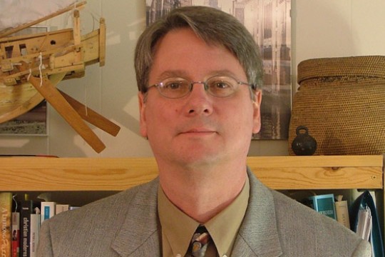 Professor posing for camera