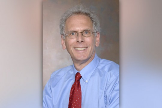 Professor posing for camera