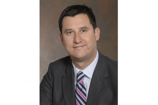 Professor posing for camera