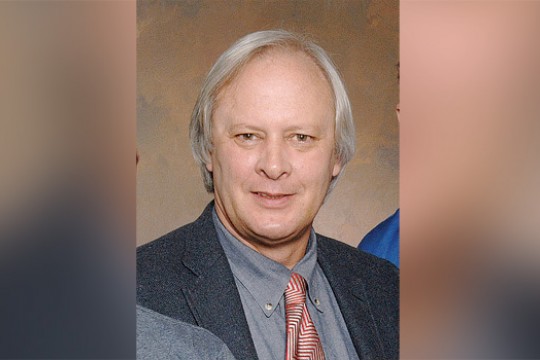 Professor posing for camera