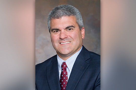 Professor posing for camera