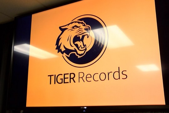 sign for Tiger Records.
