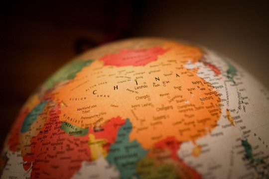 globe showing China and surrounding countries.