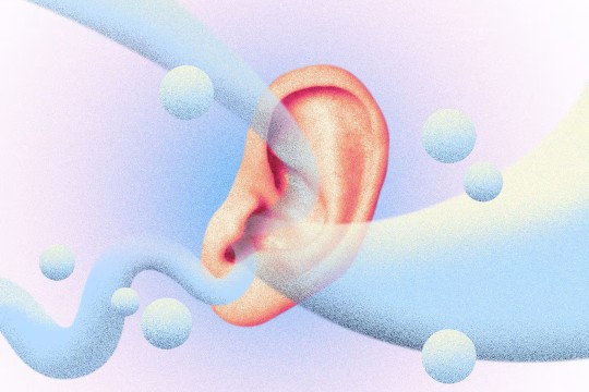 An illustration of an ear surrounded by whirls and dots