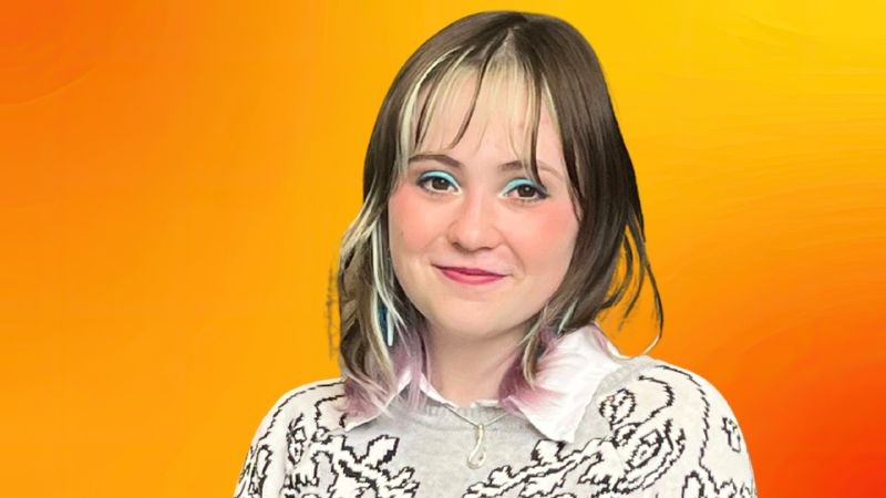 a photo of avi with an orange background