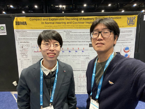 Professor Shim presenting a poster.