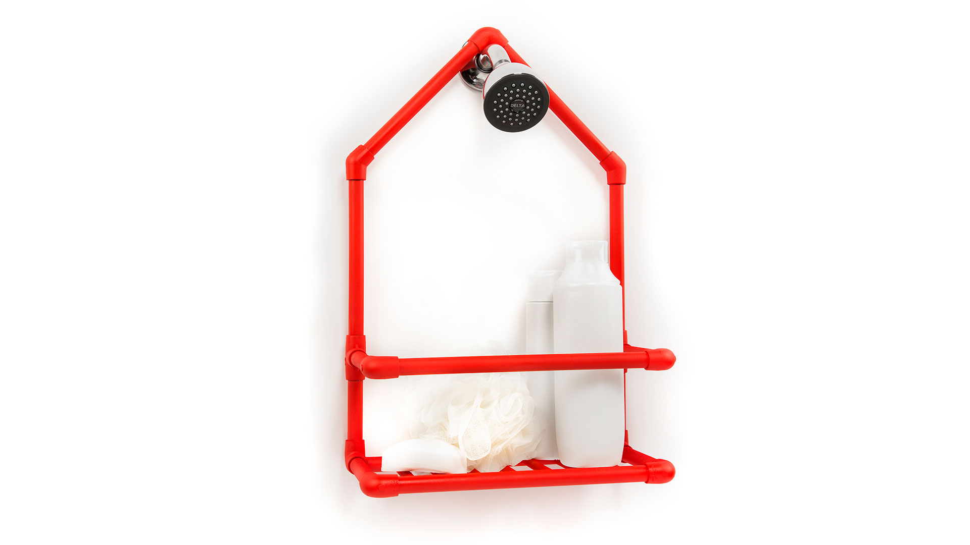 Red cylindrical piping assembled into a small shelf that comes to point above to hang over shower head, assorted shower caddy accessories on shelf