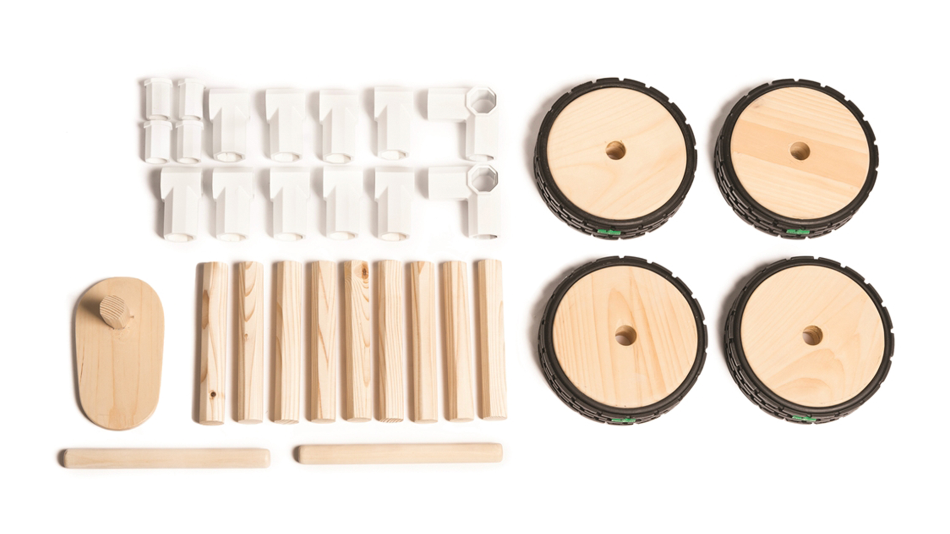Deconstructed pieces including 4 wheels, assorted joints, long wooden pegs and one wooden seat