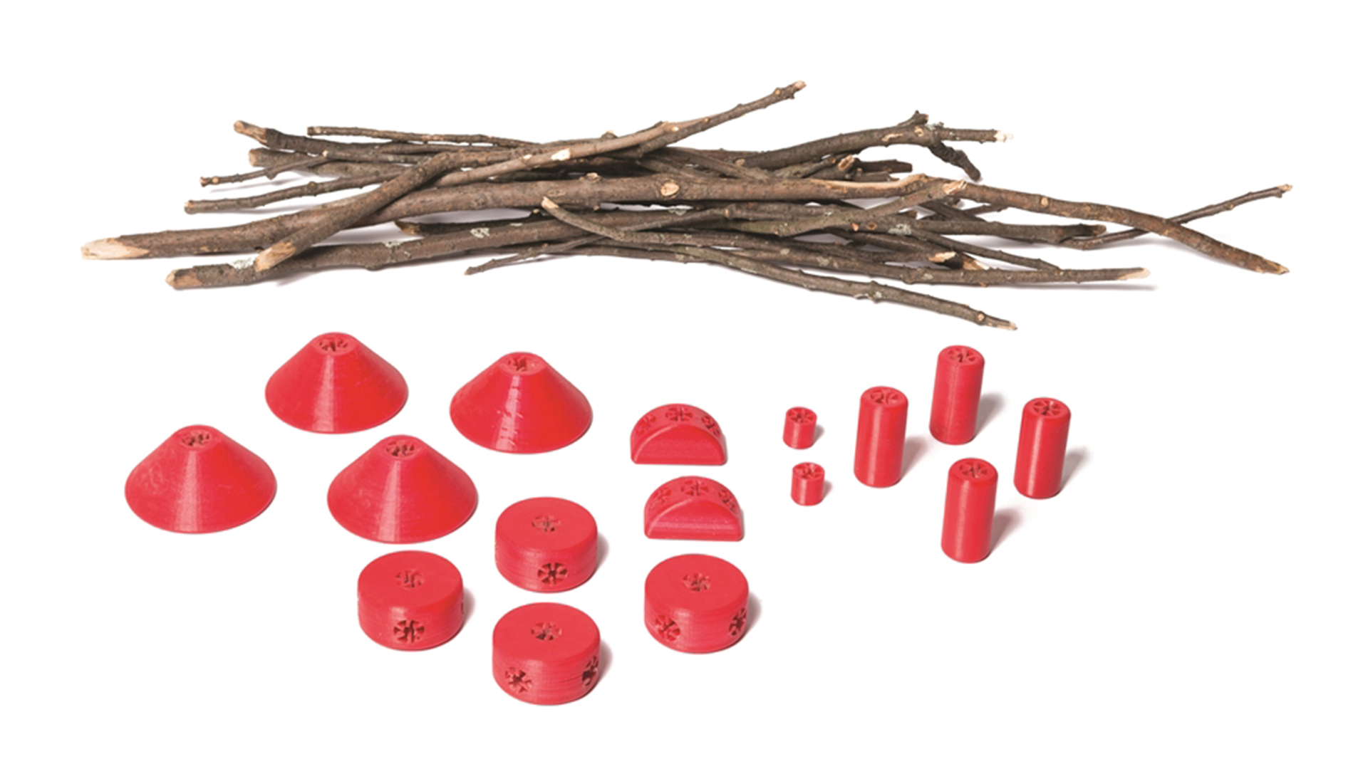 Stick connectors separated into pile of sticks and red connector pieces of various sizes and shapes