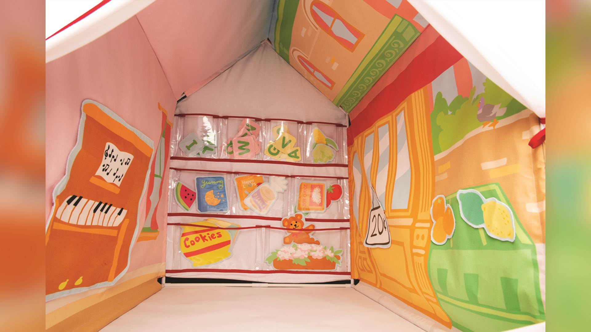 Colorful interior of play set with attachable shapes organized in pockets